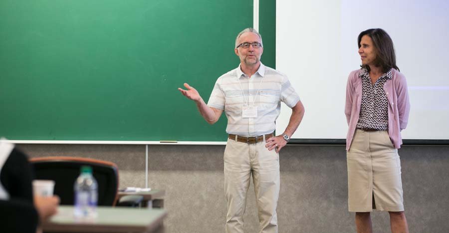 Picture of Lorne introducing a female lecturer at TSAS seminar